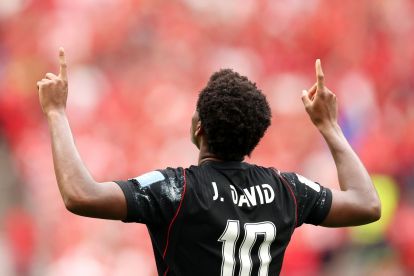 VANCOUVER, BRITISH COLUMBIA - JUNE 18: Jonathan David #10 of Canada celebrates scoring his team's third goal during the FIFA World Cup 2026 Group B match between Canada and Qatar at BC Place Vancouver on June 18, 2026 in Vancouver, British Columbia. (Photo by Fran Santiago/Getty Images)