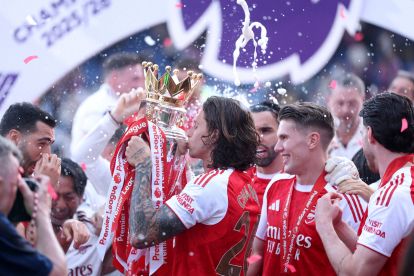 LONDON, ENGLAND - MAY 24: Riccardo Calafiori of Arsenal kisses the Premier League Trophy after their team's victory in the Premier League match between Crystal Palace and Arsenal at Selhurst Park on May 24, 2026 in London, England. (Photo by Justin Setterfield/Getty Images)