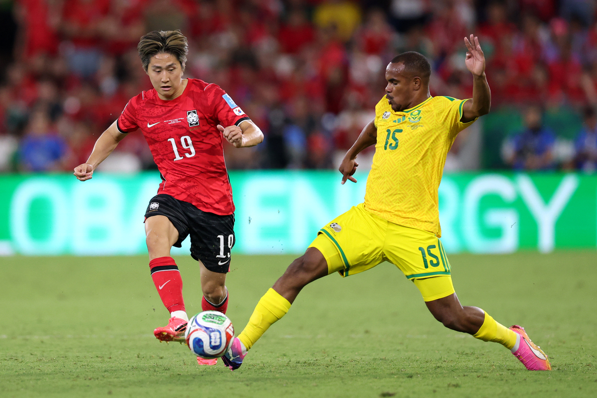 GUADALUPE, MEXICO - JUNE 24: Kang-In Lee #19 of Korea Republic competes for the ball against Iqraam Rayners #15 of South Africa during the FIFA World Cup 2026 Group A match between South Africa and Korea Republic at Monterrey Stadium on June 24, 2026 in Guadalupe, Mexico. (Photo by Luke Hales/Getty Images)