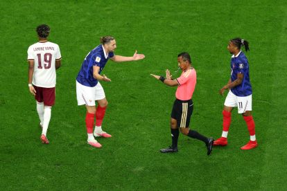 ARLINGTON, TEXAS - JULY 14: Adrien Rabiot #14 of France argues with referee Ivan Barton during the FIFA World Cup 2026 Semi Final match between France and Spain at Dallas Stadium on July 14, 2026 in Arlington, Texas. (Photo by Kevin C. Cox/Getty Images)