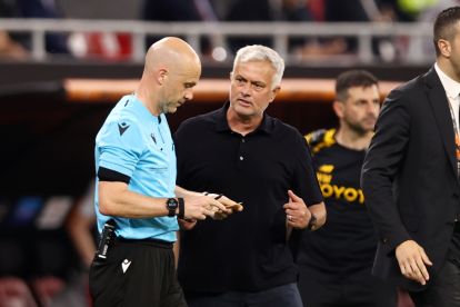 BUDAPEST, HUNGARY - MAY 31: Referee Anthony Taylor looks on with Jose Mourinho, Head Coach of AS Roma, during the UEFA Europa League 2022/23 final match between Sevilla FC and AS Roma at Puskas Arena on May 31, 2023 in Budapest, Hungary. (Photo by Naomi Baker/Getty Images)