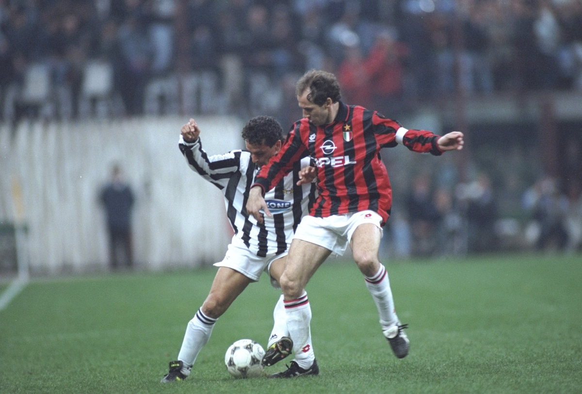 1 Apr 1995: Roberto Baggio (left) of Juventus takes on Franco Baresi (right) of AC Milan during a Serie A match at the San Siro Stadium in Milan, Italy. Juventus won the match 2-0. Mandatory Credit: Allsport UK /Allsport