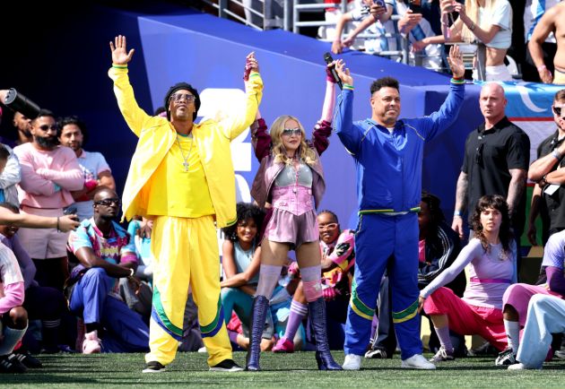 EAST RUTHERFORD, NEW JERSEY - JULY 19: Ronaldinho, Madonna and Ronaldo perform during the Topps Final Halftime Show in the FIFA World Cup 2026 Final match between Spain and Argentina at New York New Jersey Stadium on July 19, 2026 in East Rutherford, New Jersey. (Photo by Carl Recine/Getty Images)