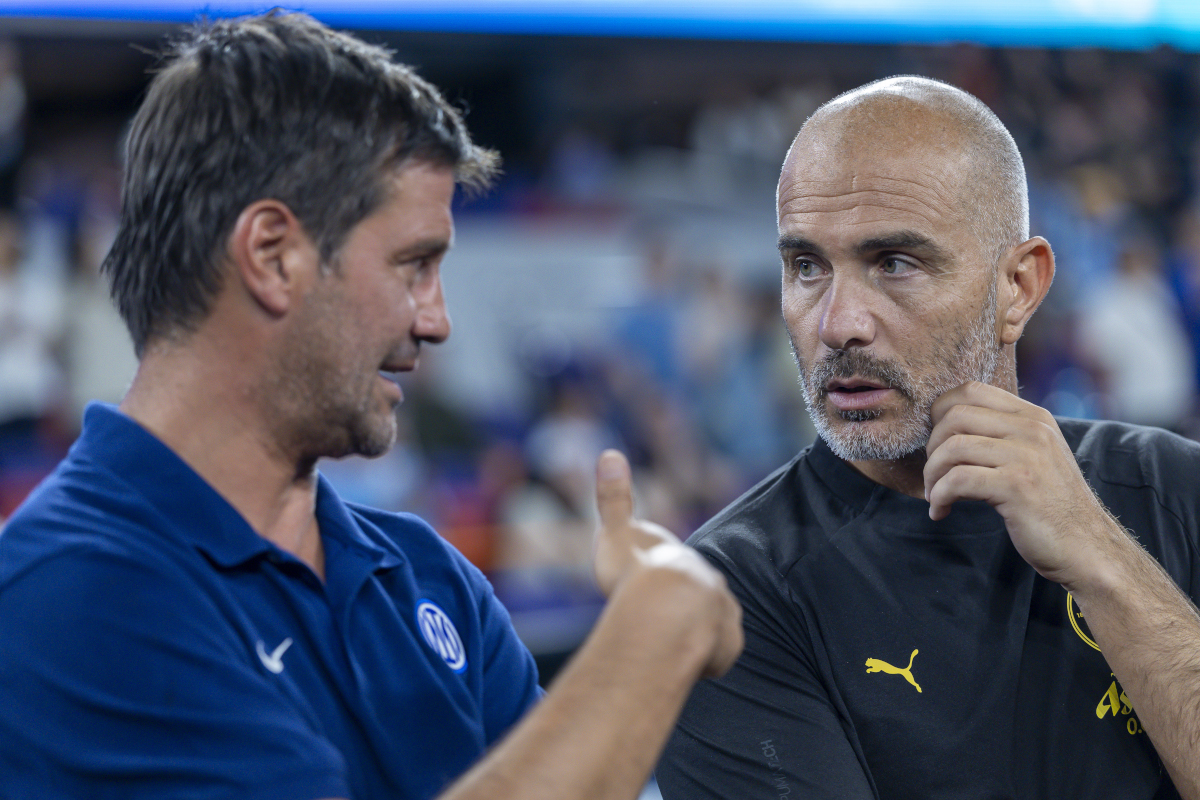 HONG KONG, CHINA - AUGUST 1: Head coach Enzo Maresca of Manchester City (R) and Team head coach Cristian Chivu (L) talk after the Manchester City v Inter Milan - Pre-Season Friendly at Kai Tak Stadium on August 1, 2026 in Hong Kong, China. (Photo by Yu Chun Christopher Wong/Eurasia Sport Images/Getty Images)