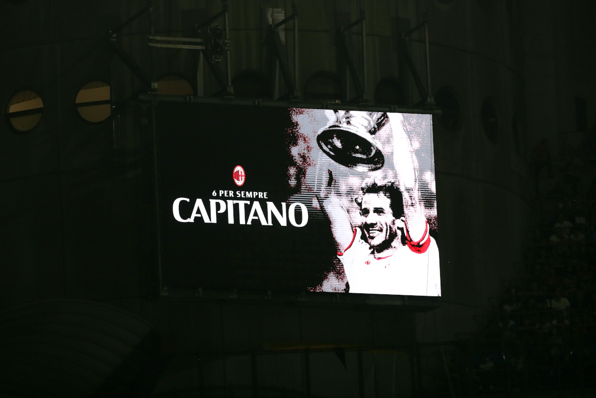 MILAN, ITALY - AUGUST 28: The big screen shows a picture of Franco Baresi as players, officials and fans take part in a minute's silence in his memory before the Serie A match between AC Milan and Venezia FC at Stadio Giuseppe Meazza on August 28, 2026 in Milan, Italy. (Photo by Marco Luzzani/Getty Images)