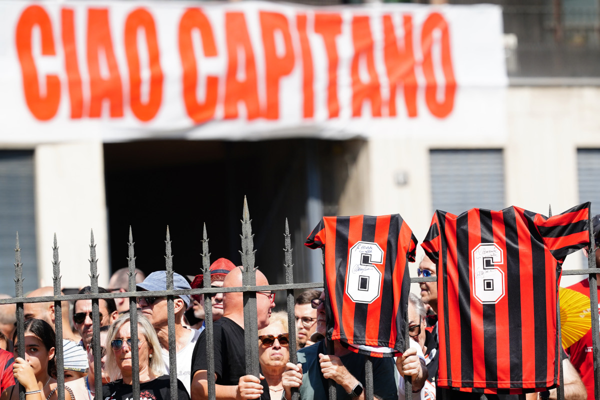 MILAN, ITALY - AUGUST 04: Supporters of AC Milan show a banner during the Franco Baresi's funeral ceremony at Basilica di Sant'Ambrogio on August 04, 2026 in Milan, Italy. (Photo by Pier Marco Tacca/Getty Images)
