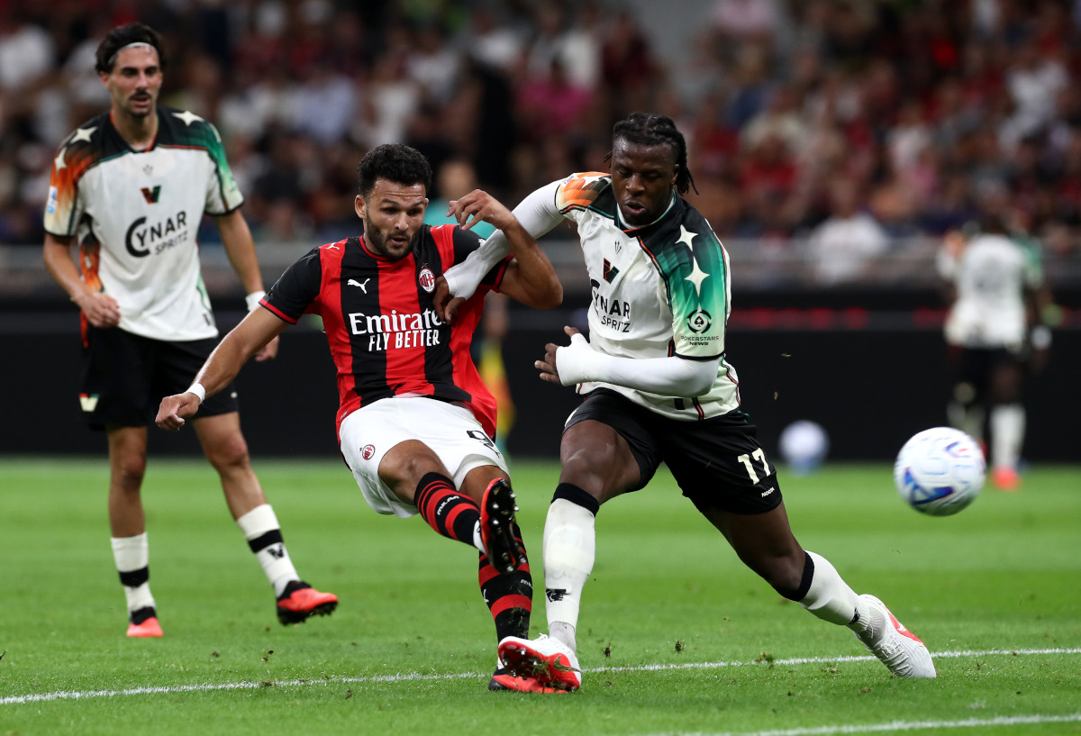 MILAN, ITALY - AUGUST 28: Goncalo Ramos of Milan shoots under pressure from Armel Bella-Kotchap of Venezia during the Serie A match between AC Milan and Venezia FC at Stadio Giuseppe Meazza on August 28, 2026 in Milan, Italy. (Photo by Marco Luzzani/Getty Images)