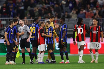 PERTH, AUSTRALIA - AUGUST 05: Luka Modric of AC Milan and Hakan Calhanoglu of FC Internazionale share a moment after the final whistle during the pre-season match between AC Milan and FC Internazionale at Optus Stadium on August 05, 2026 in Perth, Australia. (Photo by Paul Kane/Getty Images)
