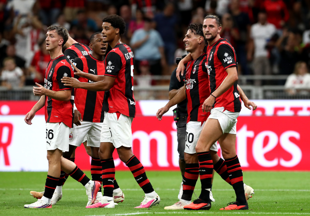 MILAN, ITALY - AUGUST 28: Ardon Jashari of AC Milan celebrates his team's second goal with teammates, an own goal scored by Redouane Halhal of Venezia during the Serie A match between AC Milan and Venezia FC at Stadio Giuseppe Meazza on August 28, 2026 in Milan, Italy. (Photo by Marco Luzzani/Getty Images)