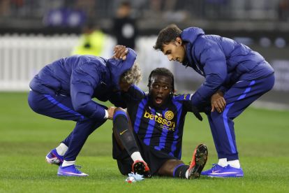 PERTH, AUSTRALIA - AUGUST 05: Yann Bisseck of FC Internazionale reacts after a head clash during a header contest during the pre-season match between AC Milan and FC Internazionale at Optus Stadium on August 05, 2026 in Perth, Australia. (Photo by James Worsfold/Getty Images)