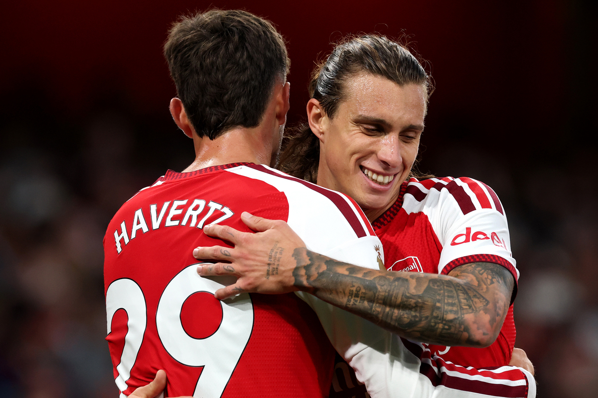 LONDON, ENGLAND - AUGUST 21: Kai Havertz of Arsenal celebrates scoring his team’s first goal with teammate Riccardo Calafiori during the Premier League 2026/27 match between Arsenal FC and Coventry City at Emirates Stadium on August 21, 2026 in London, England. (Photo by Julian Finney/Getty Images)