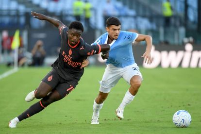 ROME, ITALY - SEPTEMBER 12: Reda Belahjane of SS Lazio compete for the ball with Alphadjo Cisse of AC Milan during the Serie A match between SS Lazio and AC Milan at Stadio Olimpico on September 12, 2026 in Rome, Italy. (Photo by Marco Rosi - SS Lazio/Getty Images)