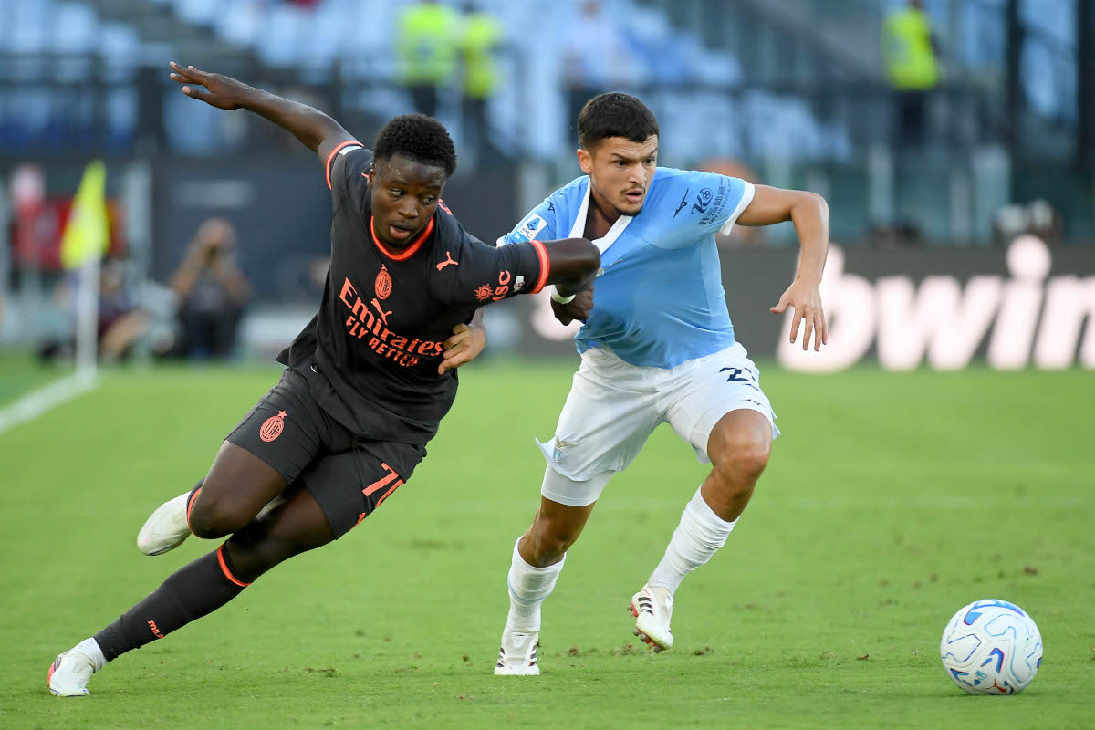 ROME, ITALY - SEPTEMBER 12: Reda Belahjane of SS Lazio compete for the ball with Alphadjo Cisse of AC Milan during the Serie A match between SS Lazio and AC Milan at Stadio Olimpico on September 12, 2026 in Rome, Italy. (Photo by Marco Rosi - SS Lazio/Getty Images)