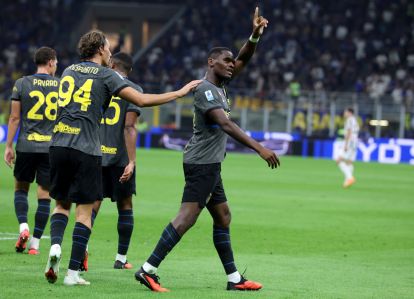 MILAN, ITALY - SEPTEMBER 14: Ange-Yoan Bonny of FC Internazionale Milano celebrates scoring his team’s fifth goal during the Serie A match between FC Internazionale and Udinese Calcio at Stadio Giuseppe Meazza on September 14, 2026 in Milan, Italy. (Photo by Claudio Villa/Getty Images)