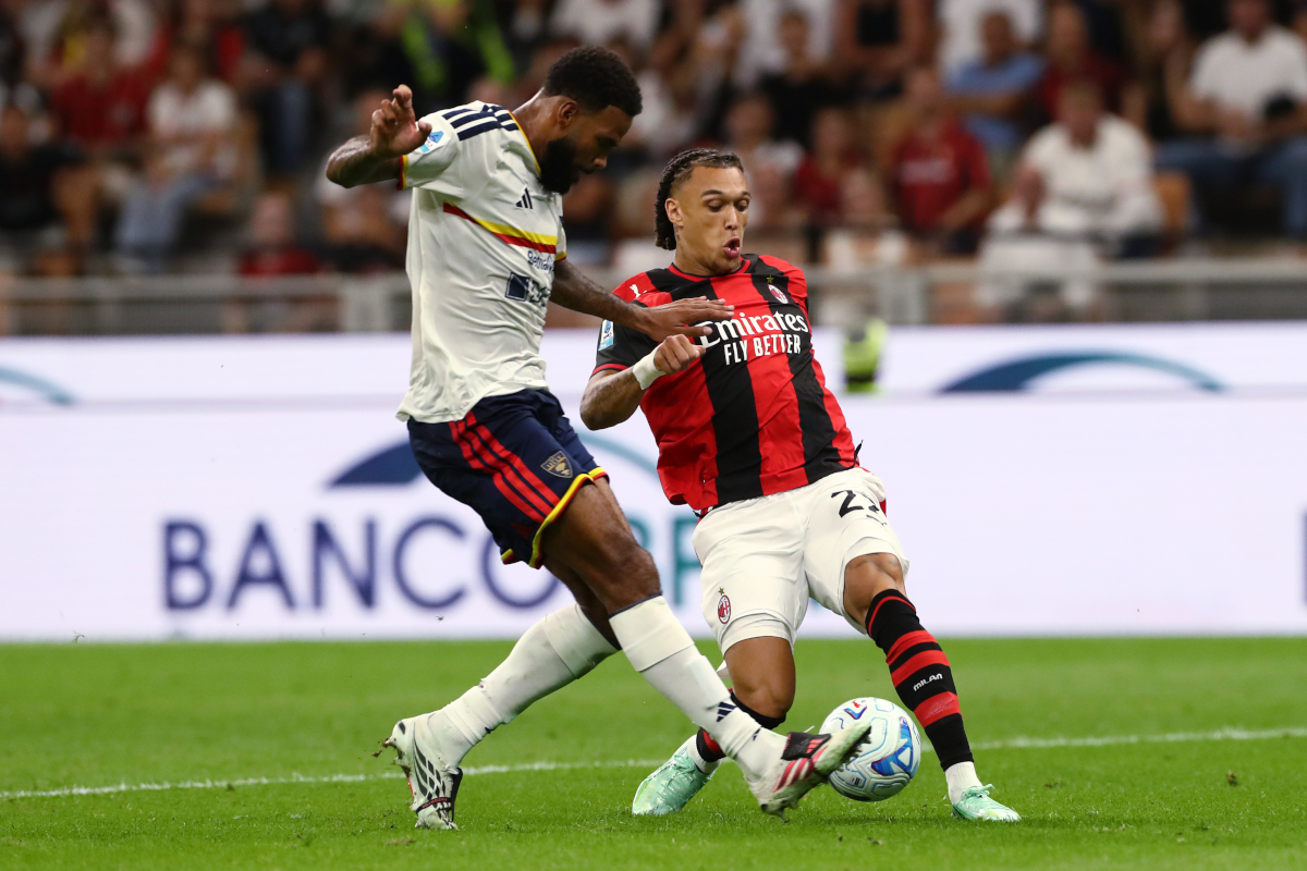 MILAN, ITALY - SEPTEMBER 20: Diego Moreira of AC Milan is challenged by Jamil Siebert of U.S. Lecce during the Serie A match between AC Milan and US Lecce at Stadio Giuseppe Meazza on September 20, 2026 in Milan, Italy. (Photo by Marco Luzzani/Getty Images)