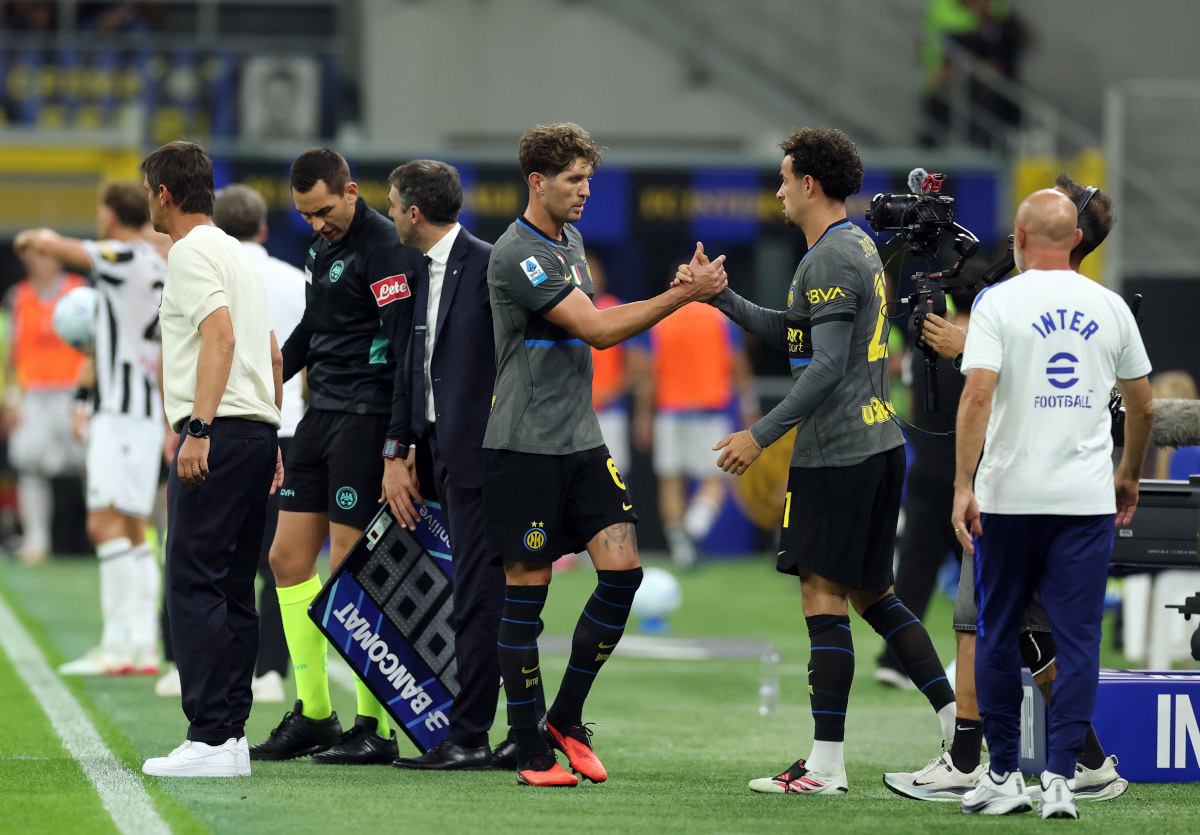 MILAN, ITALY - SEPTEMBER 14: John Stones of FC Internazionale Milano is substituted and replaced by teammate Curtis Jones during the Serie A match between FC Internazionale and Udinese Calcio at Stadio Giuseppe Meazza on September 14, 2026 in Milan, Italy. (Photo by Claudio Villa/Getty Images)