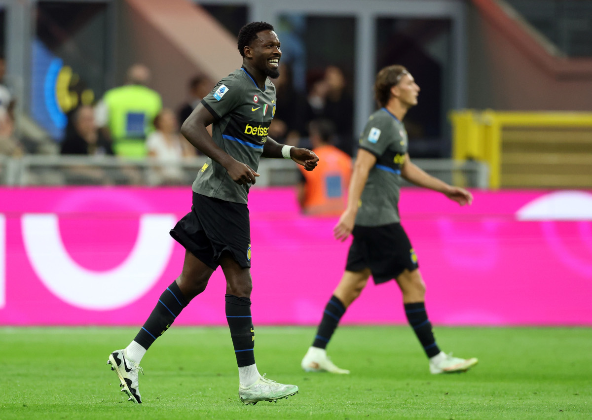 MILAN, ITALY - SEPTEMBER 14: Marcus Thuram of FC Internazionale Milano celebrates scoring his team’s third goal during the Serie A match between FC Internazionale and Udinese Calcio at Stadio Giuseppe Meazza on September 14, 2026 in Milan, Italy. (Photo by Claudio Villa/Getty Images)