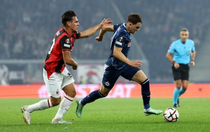 SALZBURG, AUSTRIA - OCTOBER 15: Bartosz Mazurek of FC Red Bull Salzburg is challenged by Ardon Jashari of AC Milan during the UEFA Europa League 2026/27 League Phase MD2 match between FC Salzburg and AC Milan at Stadion Salzburg on October 15, 2026 in Salzburg, Austria. (Photo by Jasmin Walter/Getty Images)
