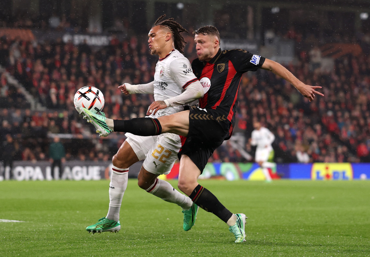 BOURNEMOUTH, ENGLAND - OCTOBER 22: Adrien Truffert of Bournemouth controls the ball under pressure from Diego Moreira of AC Milan during the UEFA Europa League 2026/27 League Phase MD3 match between AFC Bournemouth and AC Milan at Bournemouth Stadium on October 22, 2026 in Bournemouth, England. (Photo by Ryan Pierse/Getty Images)
