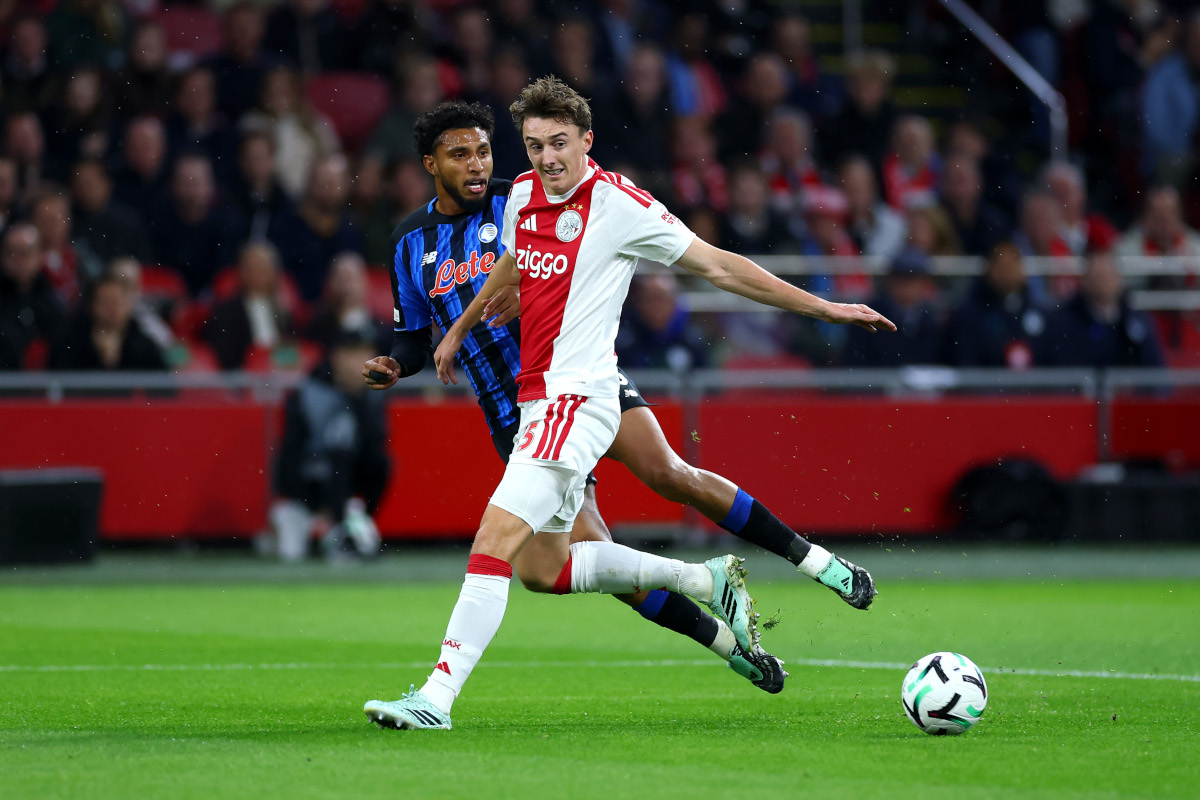 AMSTERDAM, NETHERLANDS - OCTOBER 22: Ederson of Atalanta BC passes the ball under pressure from Youri Baas of Ajax during the UEFA Conference League 2026/27 League Phase MD2 match between AFC Ajax and Atalanta BC at Johan Cruijff Arena on October 22, 2026 in Amsterdam, Netherlands. (Photo by Dean Mouhtaropoulos/Getty Images)