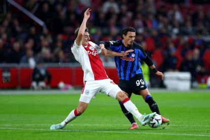 AMSTERDAM, NETHERLANDS - OCTOBER 22: Eljif Elmas of Atalanta BC shoots under pressure from Youri Baas of Ajax during the UEFA Conference League 2026/27 League Phase MD2 match between AFC Ajax and Atalanta BC at Johan Cruijff Arena on October 22, 2026 in Amsterdam, Netherlands. (Photo by Dean Mouhtaropoulos/Getty Images)
